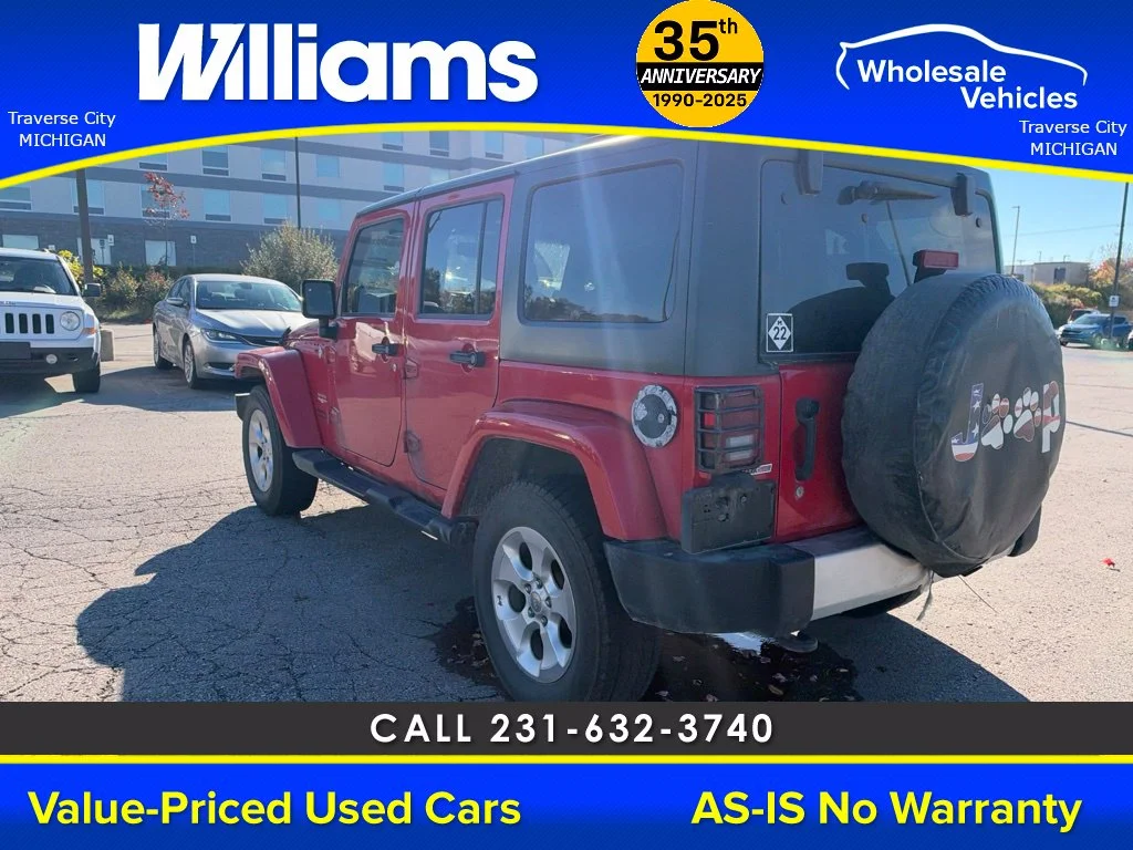 Used 2013 Flame Red Jeep Unlimited Sahara image 10