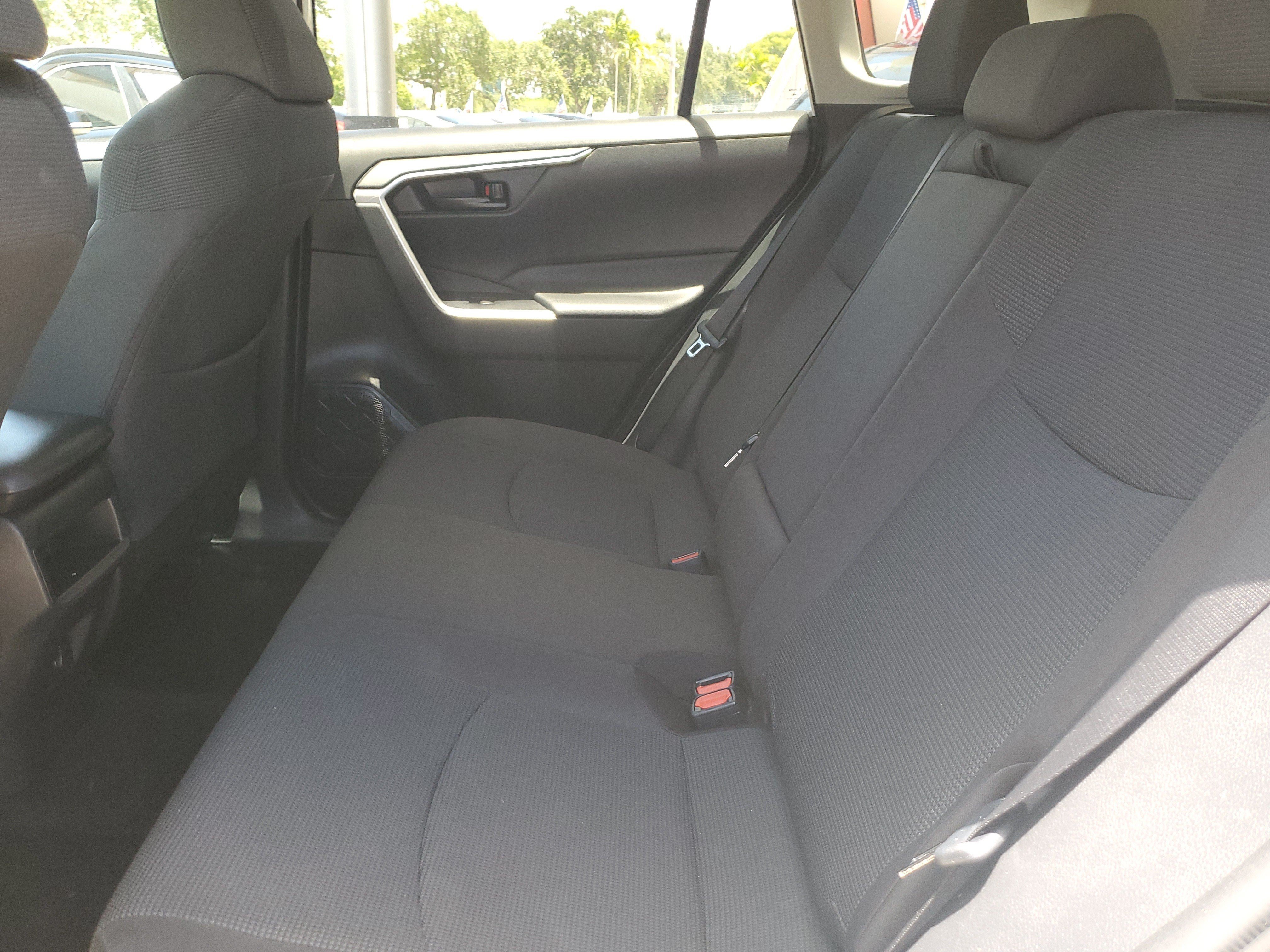 Used 2021 Super White Toyota LE image 11