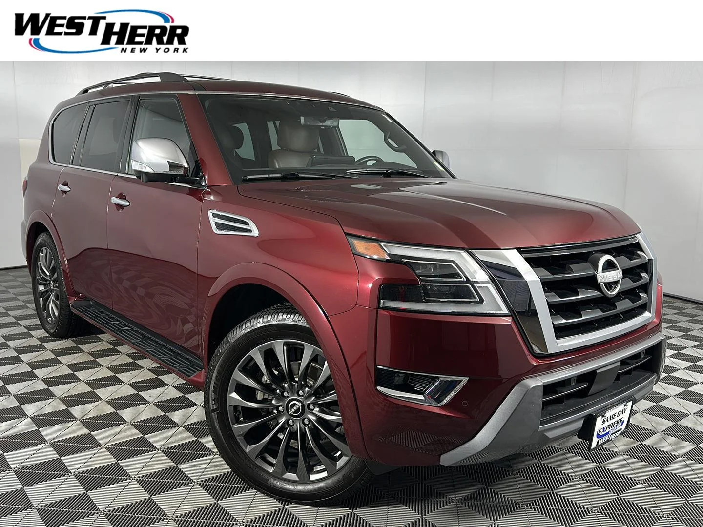 Used 2023 Coulis Red Pearl Nissan Platinum image 1