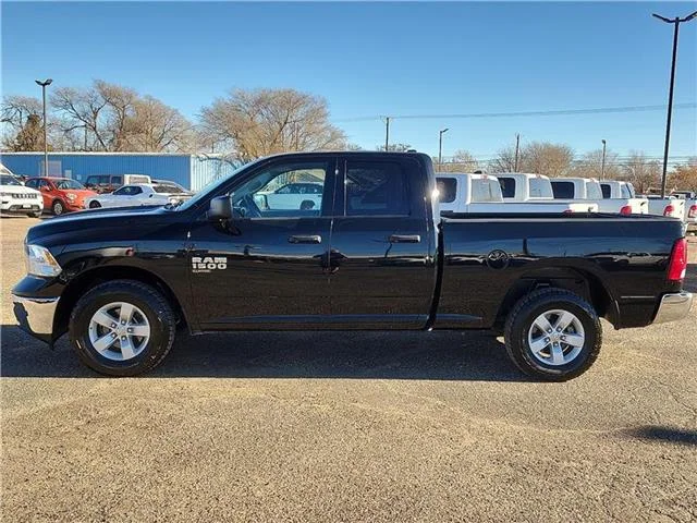 Used 2024 Black Clearcoat RAM SLT 4x4 Quad Cab 6.3 ft. box 140 in. WB image 2