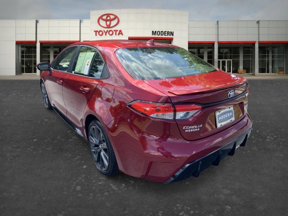 Certified Used 2025 Ruby Flare Pearl Toyota Hybrid SE image 6