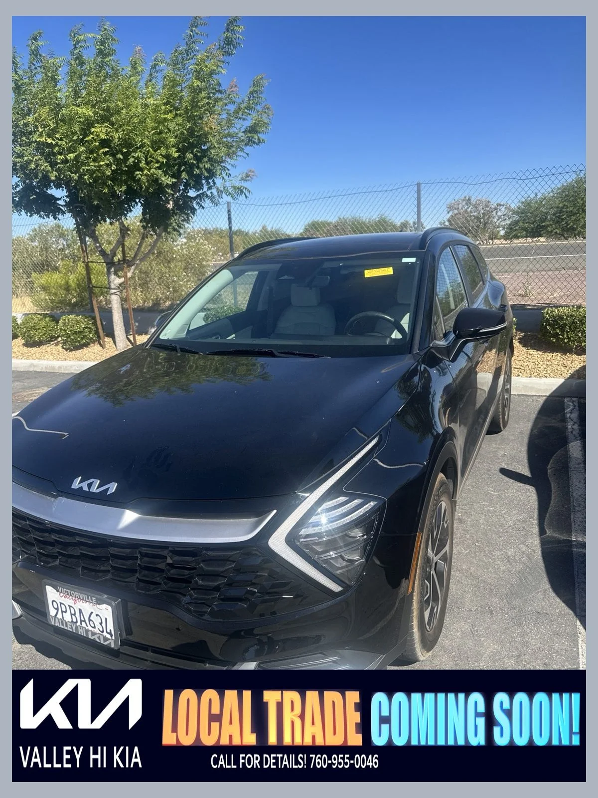 Used 2025 Ebony Black Kia EX image 1