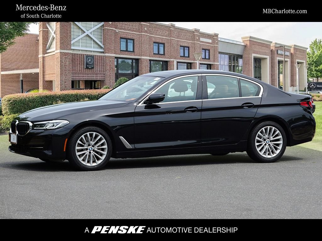 Used 2023 Black Sapphire Metallic BMW 530i xDrive image 1