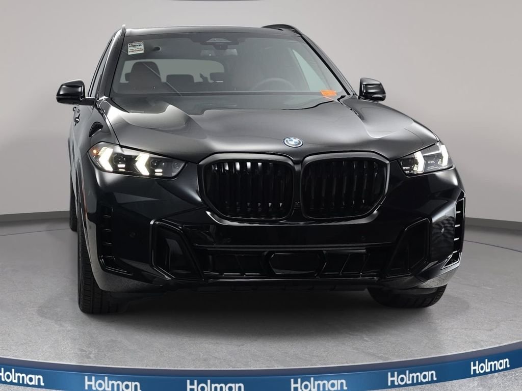 New 2026 Black Sapphire Metallic BMW xDrive50e image 2