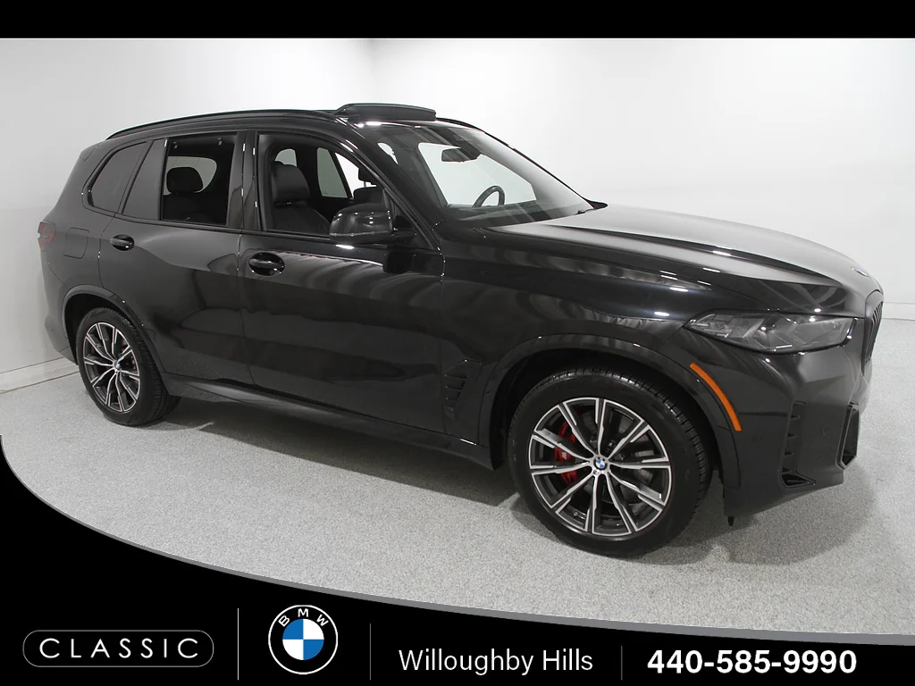 Certified Used 2024 BLACK BMW xDrive40i image 1