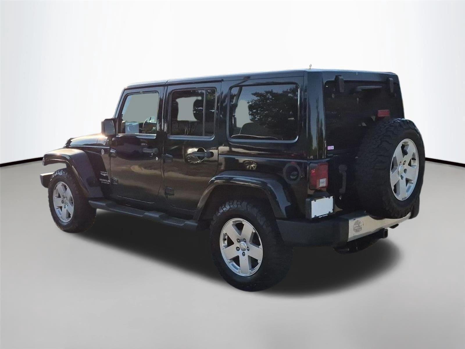 Used 2011 Black Clear Coat Jeep Sahara image 3