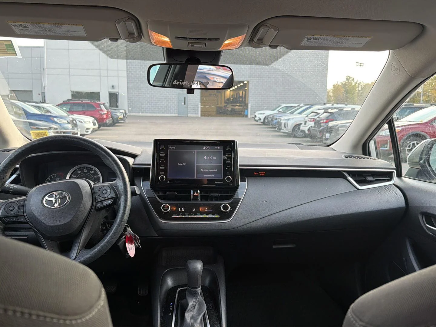 Used 2021 Classic Silver Metallic Toyota LE image 20