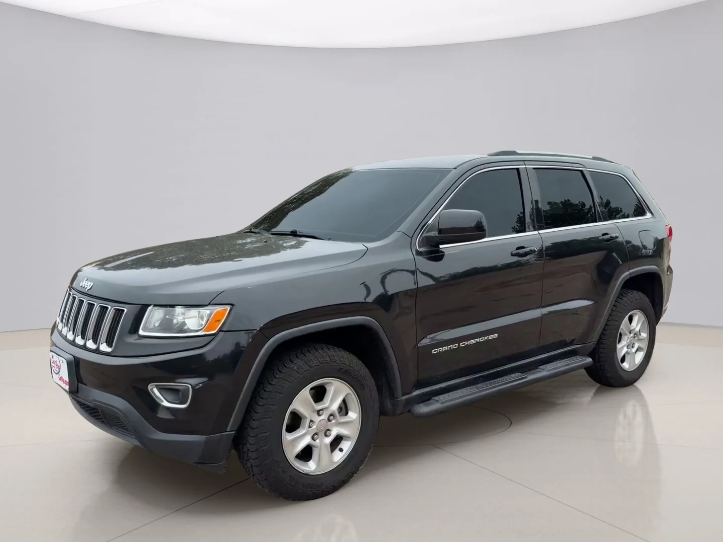 Used 2015 Black Jeep LAREDO image 1