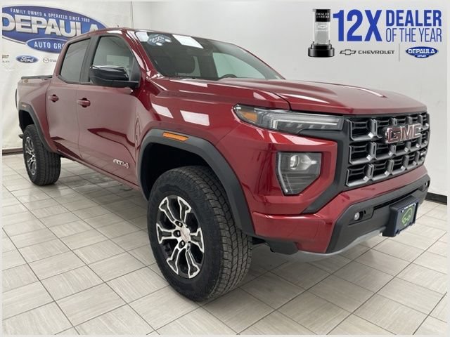 Certified Used 2023 Volcanic Red Tintcoat GMC AT4 image 1