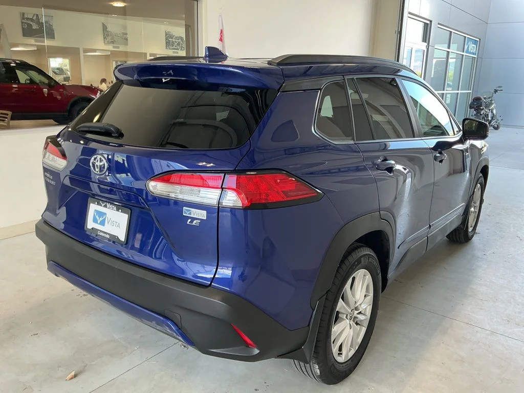 Used 2023 Blue Crush Metallic Toyota LE image 6
