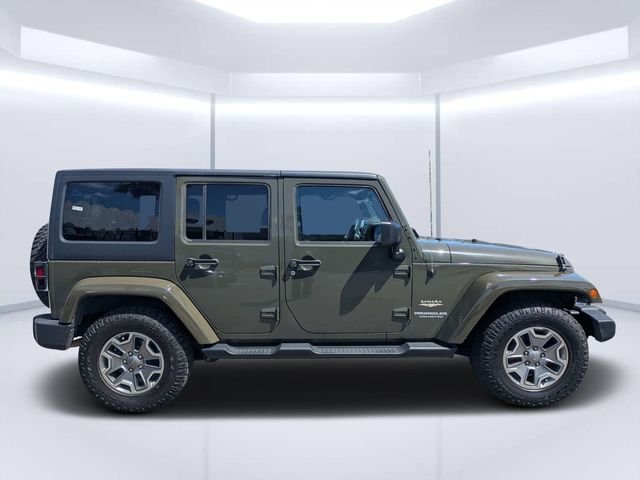 Used 2015 Green Jeep Unlimited Sahara image 2