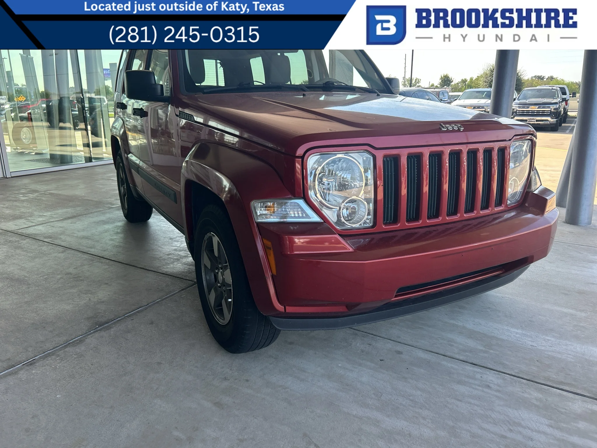 Used 2008 Inferno Red Crystal Pearlcoat Jeep Sport image 1