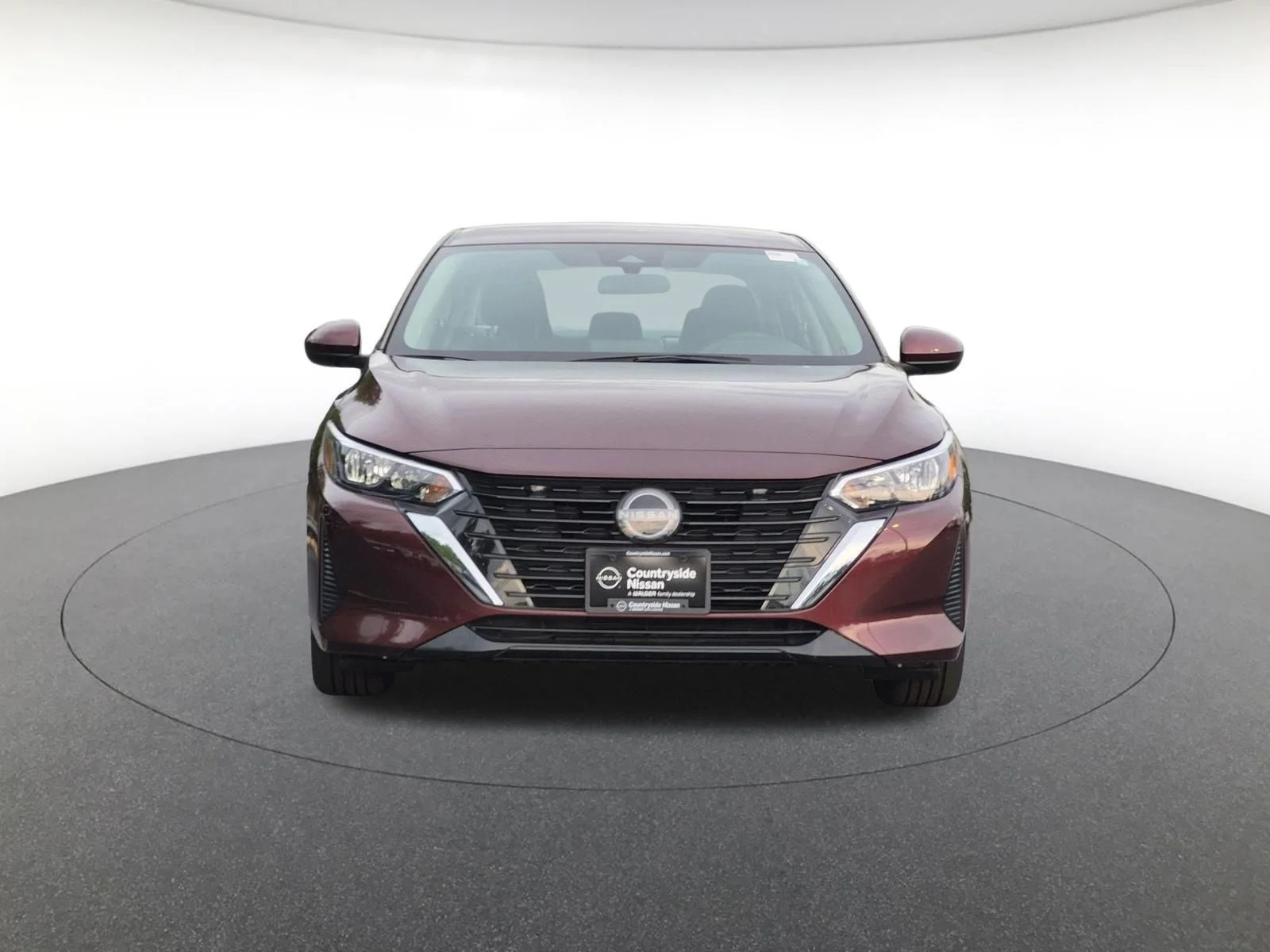 Used 2024 Rosewood Metallic Nissan SV image 2