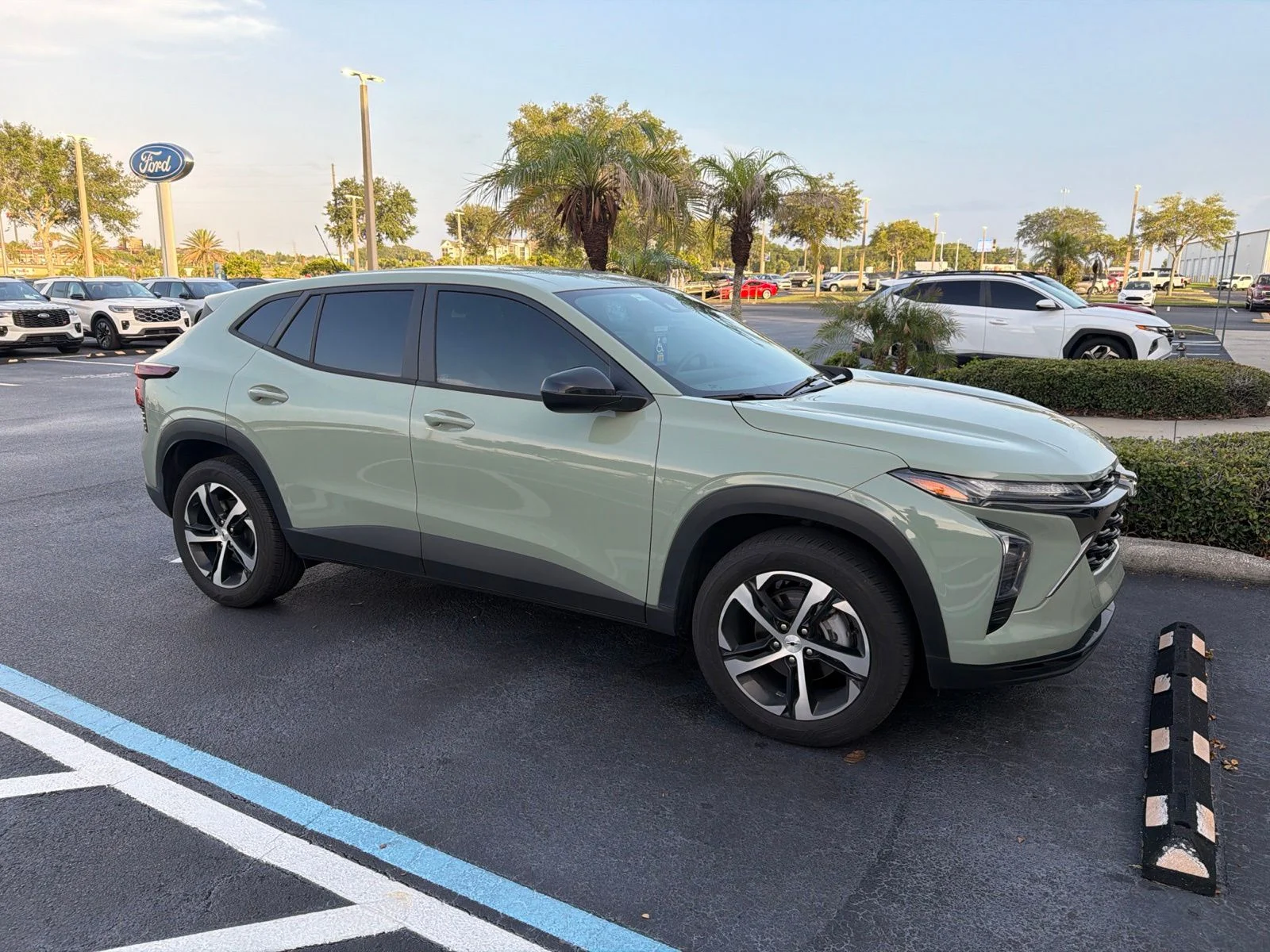 Certified Used 2024 Green Chevrolet 1RS image 1