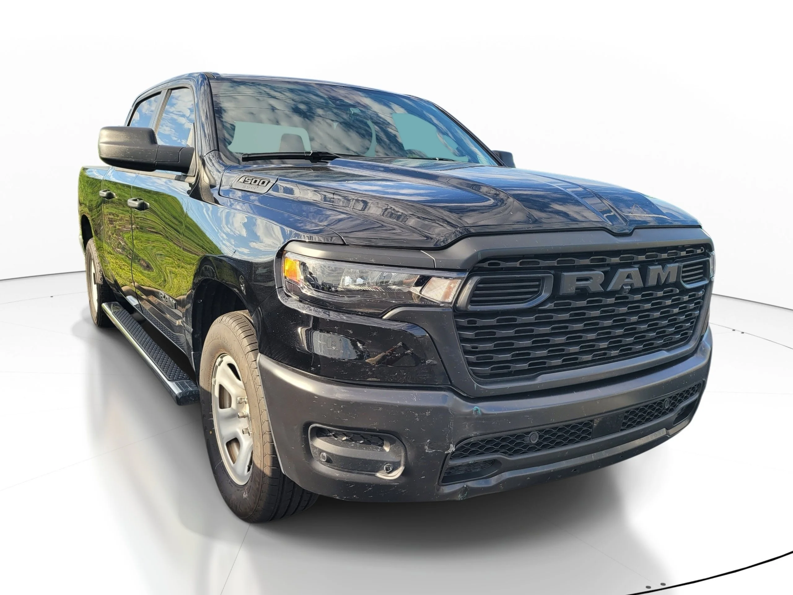 Used 2025 Diamond Black Crystal Pearlcoat Ram Tradesman image 1