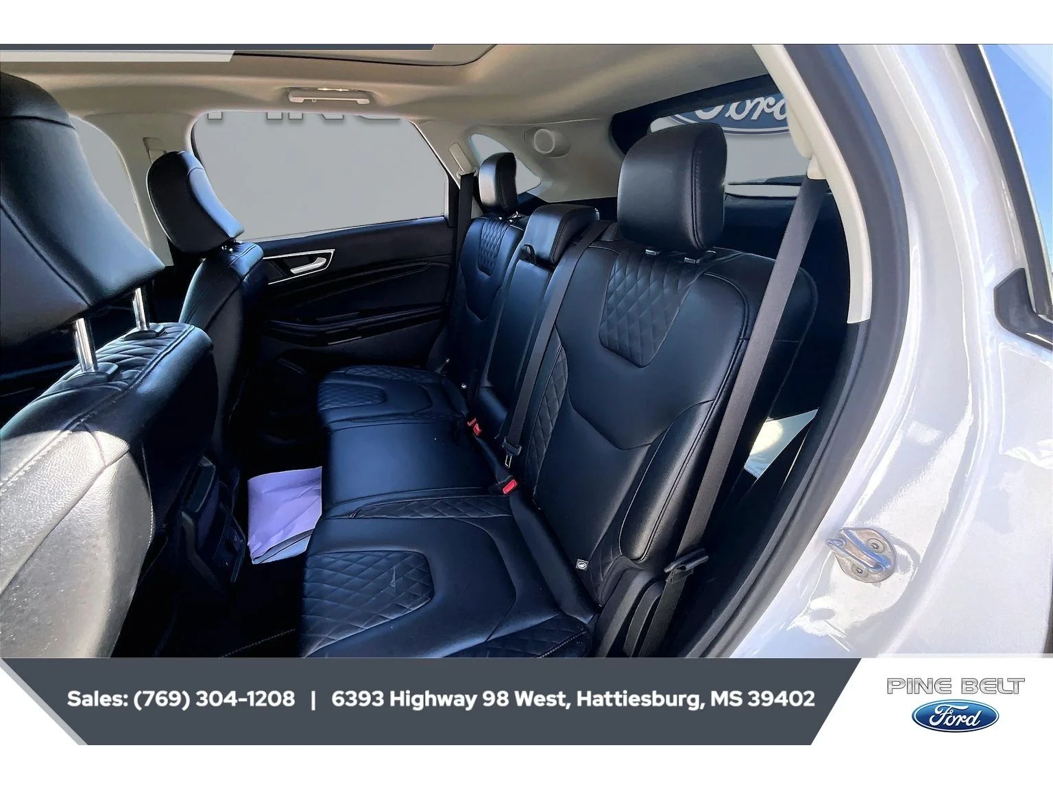 Used 2024 Star White Metallic Tri-Coat Ford Titanium image 19