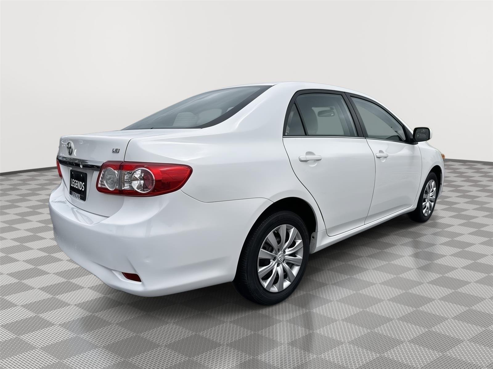 Used 2013 Super White Toyota LE image 12