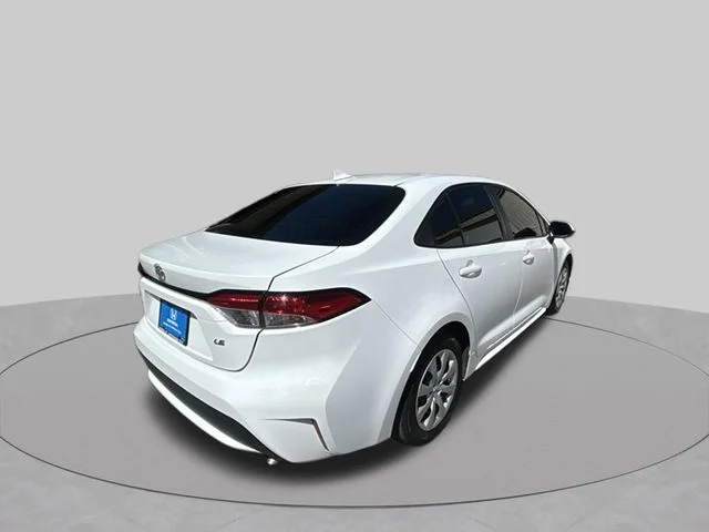 Used 2021 Super White Toyota LE image 5