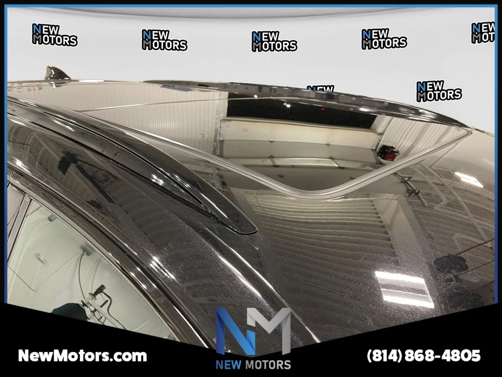 Used 2022 Black Metallic Cadillac Sport image 16