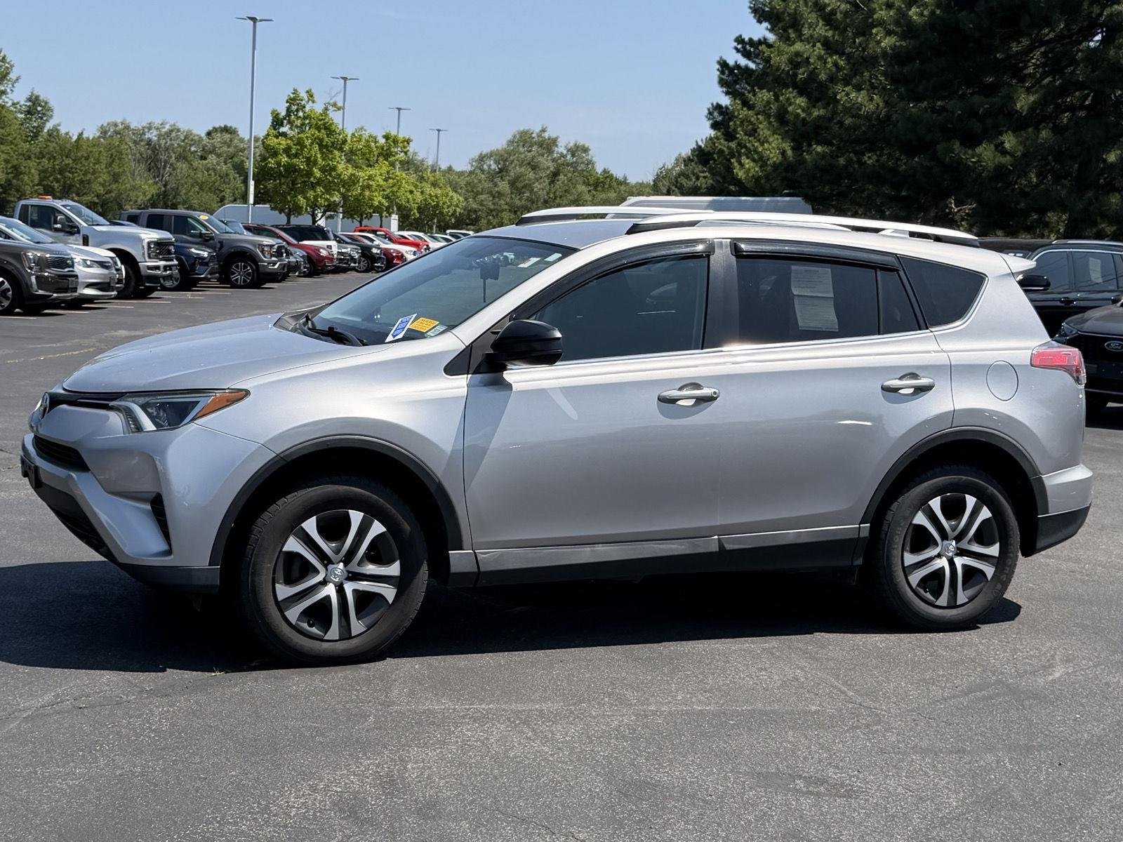 Used 2016 Silver Sky Metallic Toyota LE image 6