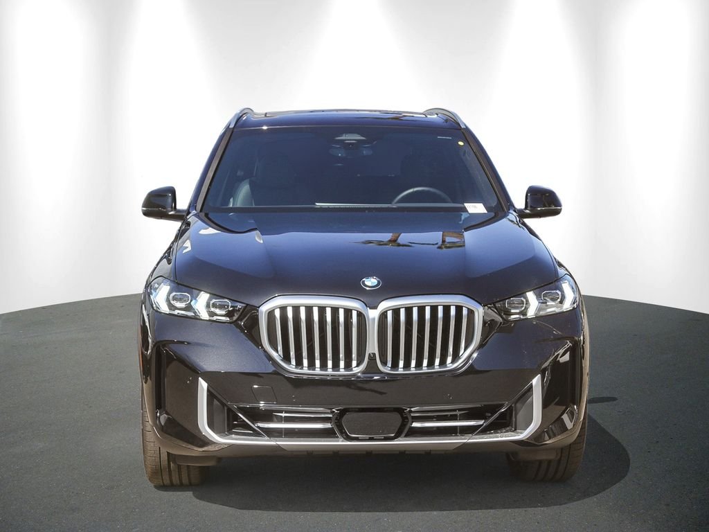 New 2026 Black Sapphire Metallic BMW sDrive40i image 2