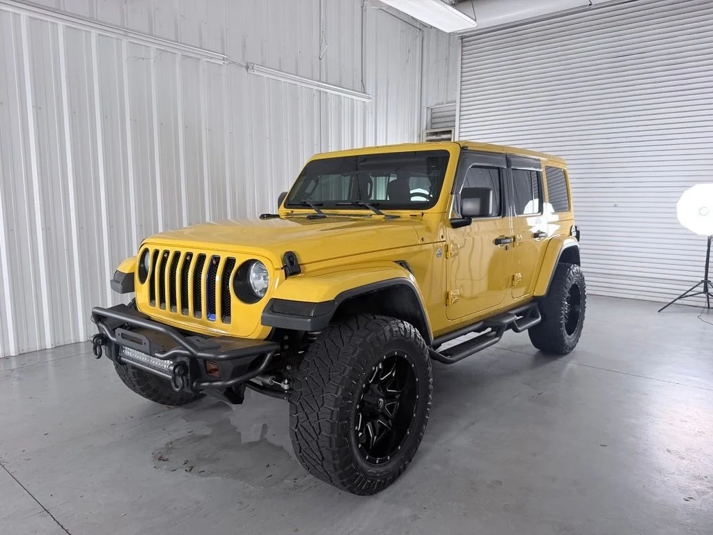Used 2018 Yellow Jeep Unlimited Sahara image 1