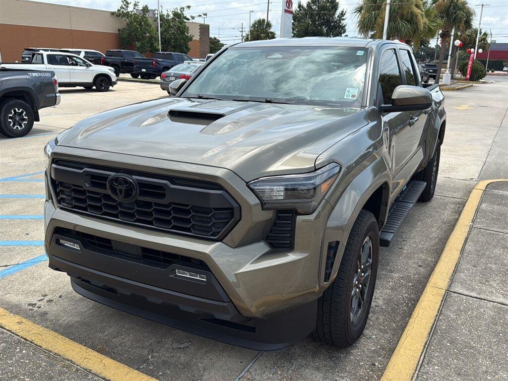 Used 2025 Bronze Oxide Toyota TRD Sport image 1