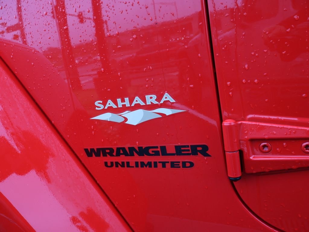 Used 2015 Red Jeep Unlimited Sahara image 8