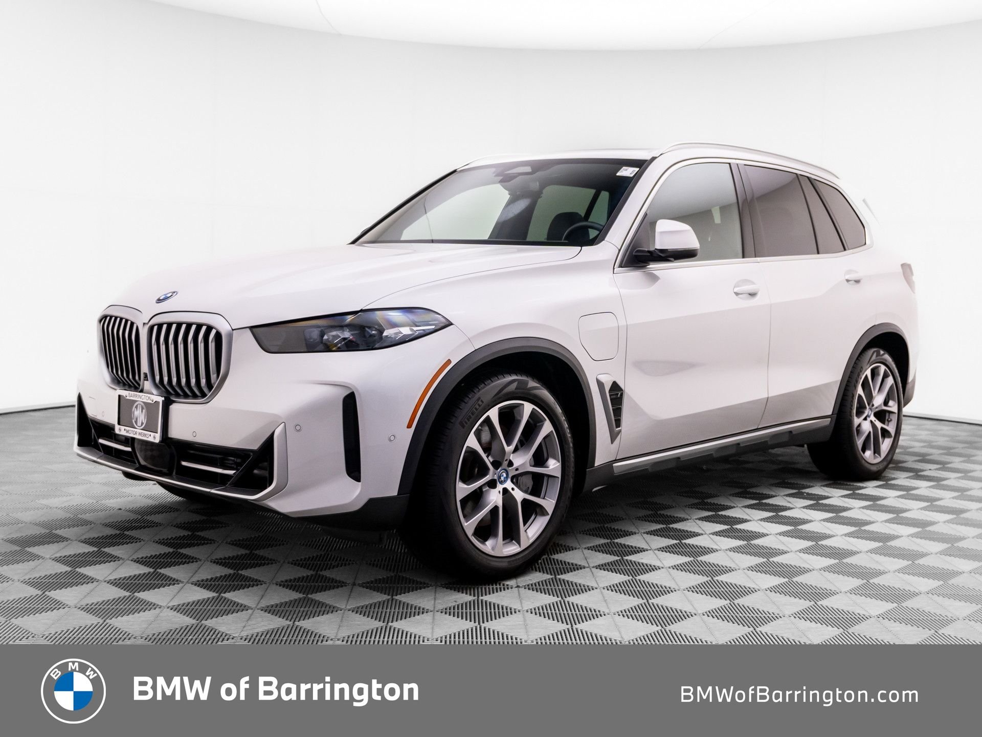 Certified Used 2024 Mineral White Metallic BMW xDrive50e image 1