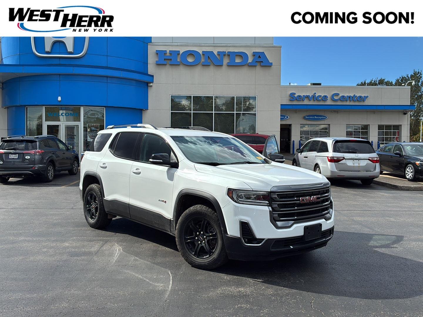 Used 2023 Summit White GMC AT4 image 1