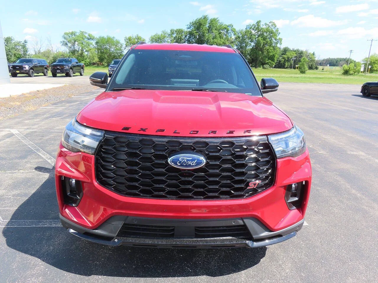 New 2026 Rapid Red Metallic Tinted Clearcoat Ford ST AWD 4dr SUV image 2
