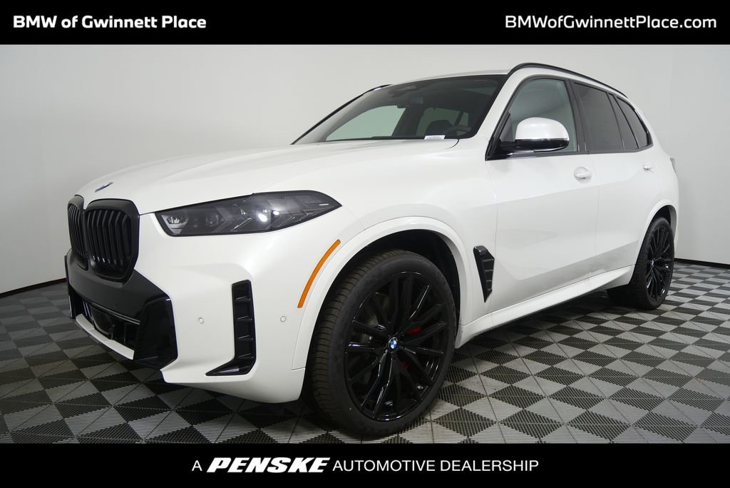Used 2026 Mineral White Metallic BMW xDrive40i image 1
