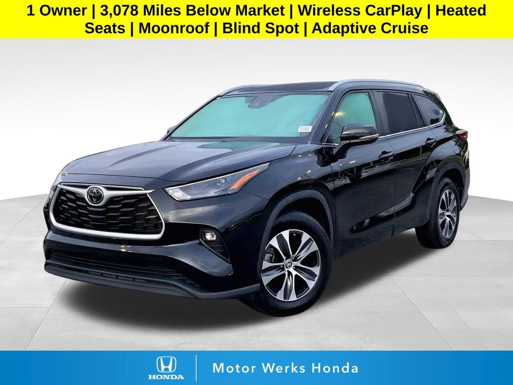 Used 2023 Midnight Black Metallic Toyota XLE image 1
