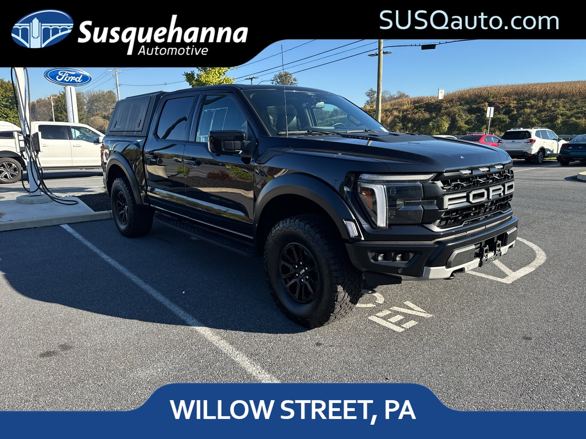Used 2025 Agate Black Metallic Ford Raptor image 1