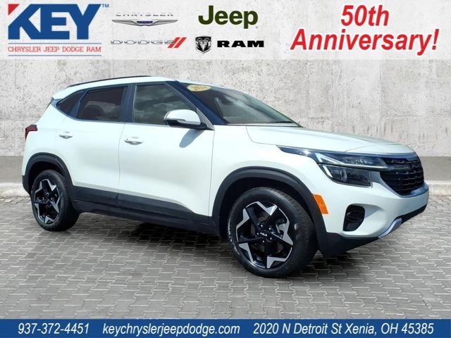 Used 2024 Snow White Pearl Kia EX image 1