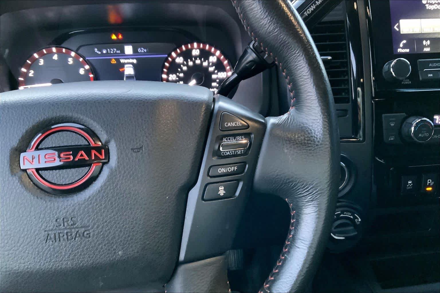 Used 2024 Gun Metallic Nissan PRO-4X image 24