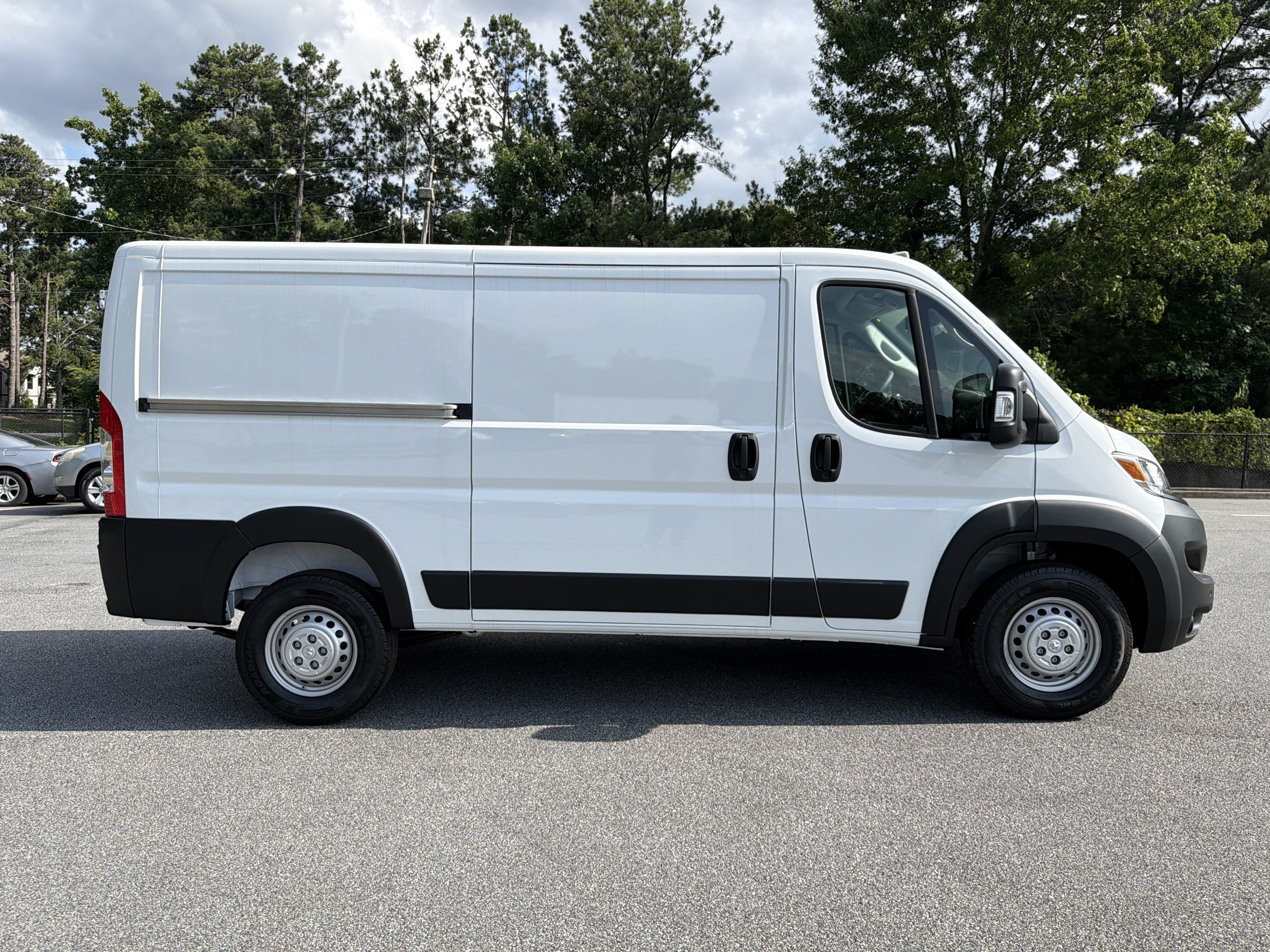 New 2026 Bright White Clearcoat RAM Low Roof image 9