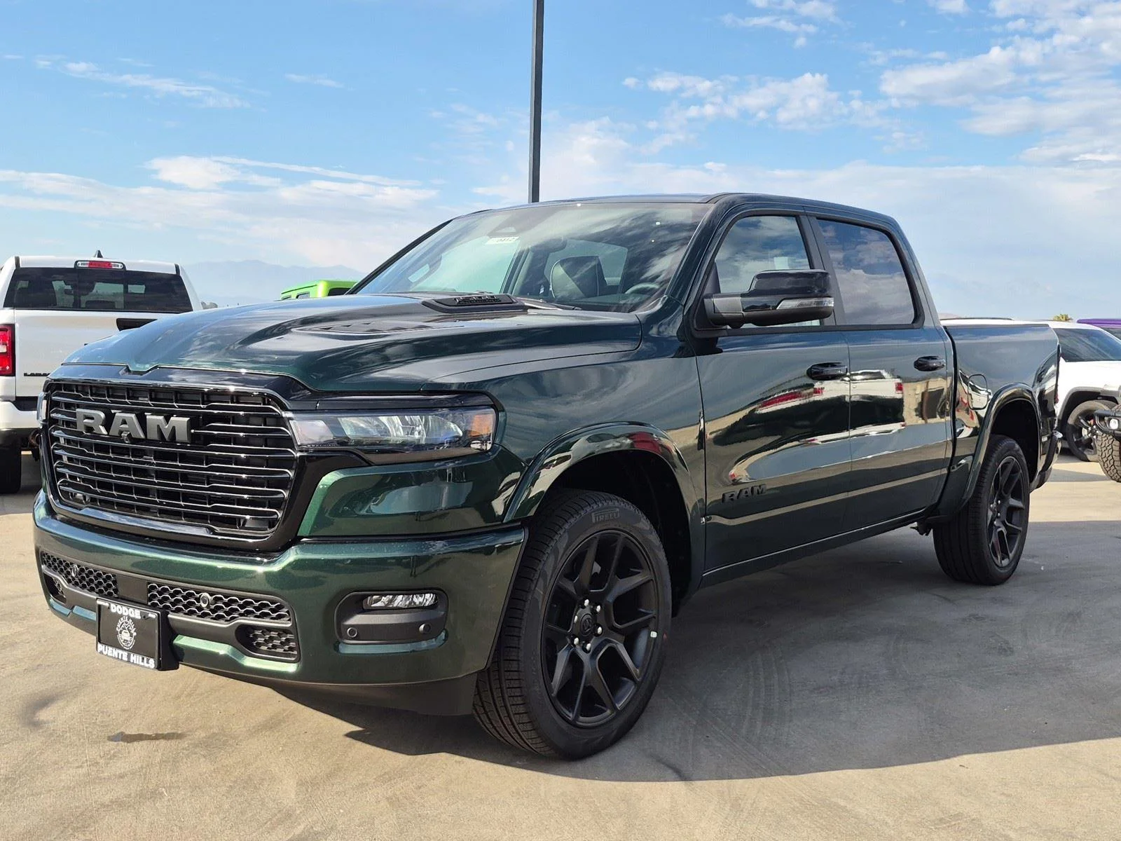 New 2026 Serrano-Green Metallic Exterior Paint RAM Laramie image 3