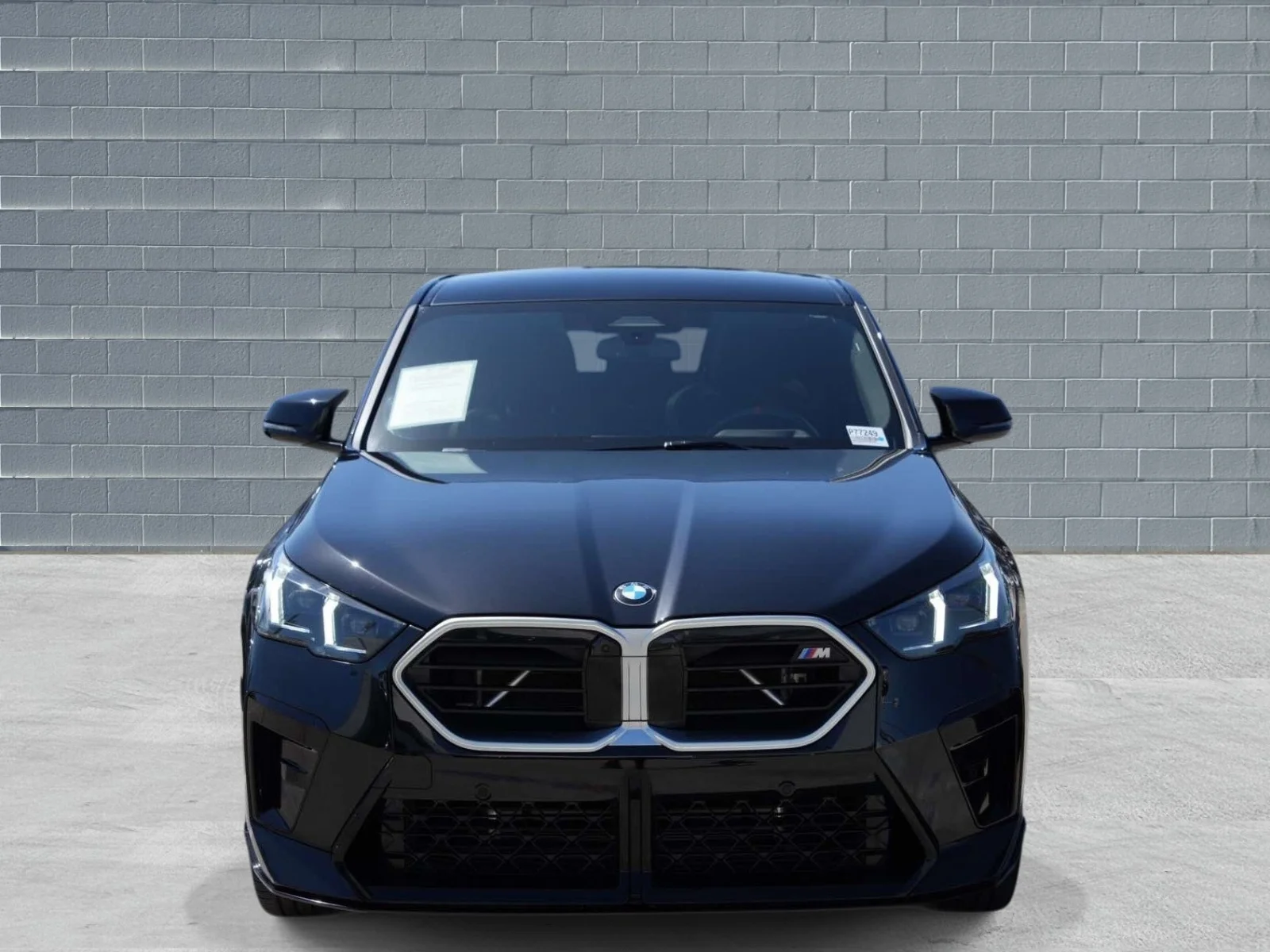 Used 2025 Black Sapphire Metallic BMW M35i Sports Activity Coupe image 2