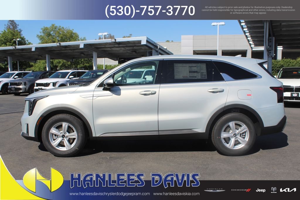 New 2026 Ivory Silver Kia LX image 2