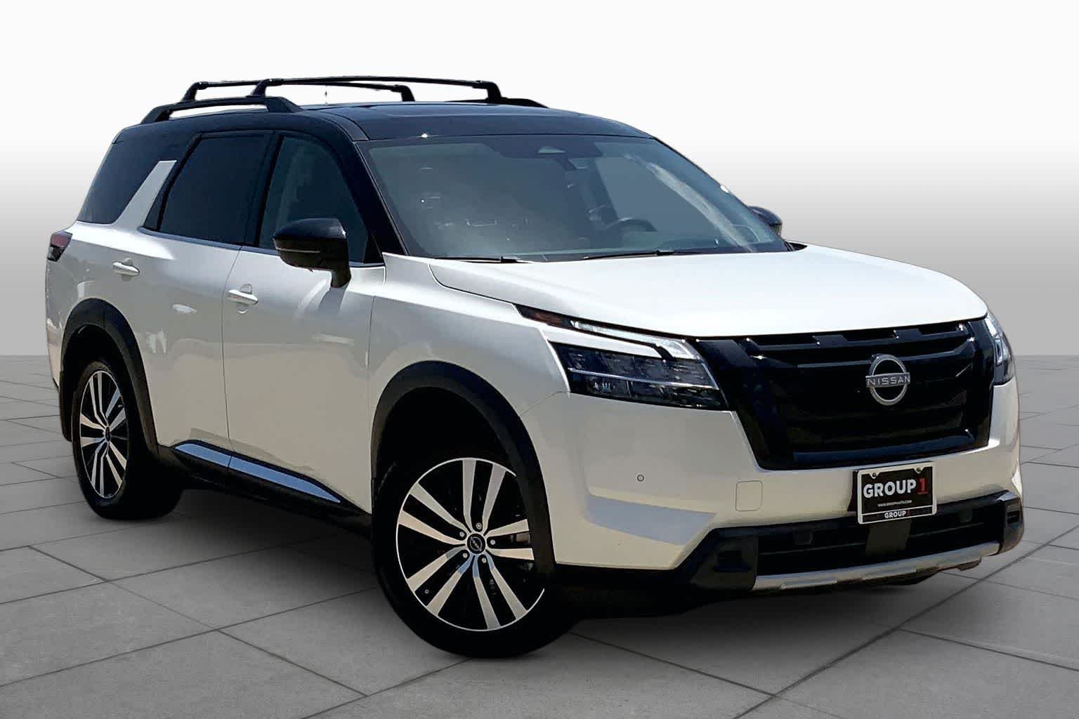 Used 2024 Pearl White Tricoat/Super Black Nissan Platinum image 3