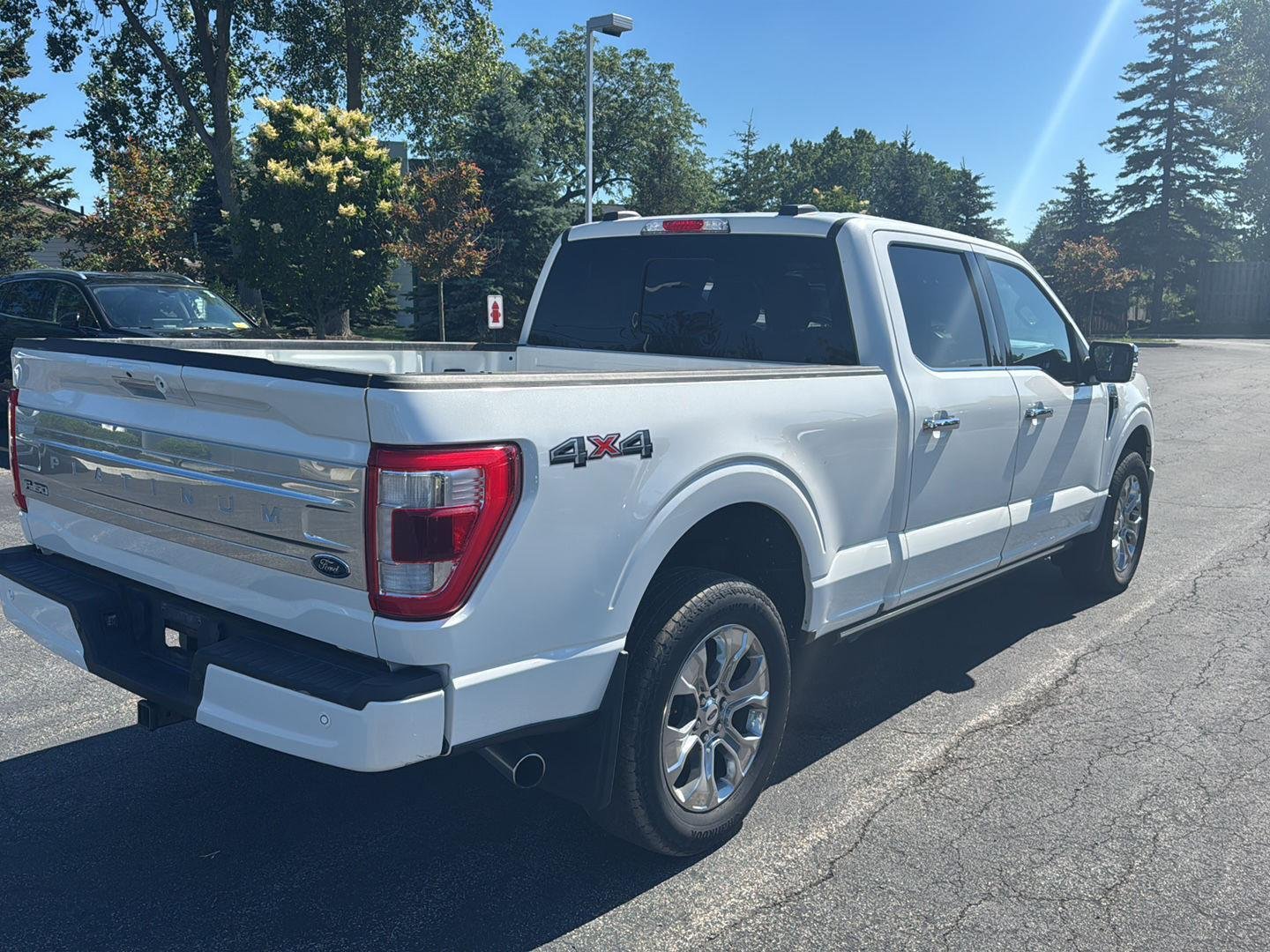 Used 2021 Star White Metallic Tri-Coat Ford Platinum image 4