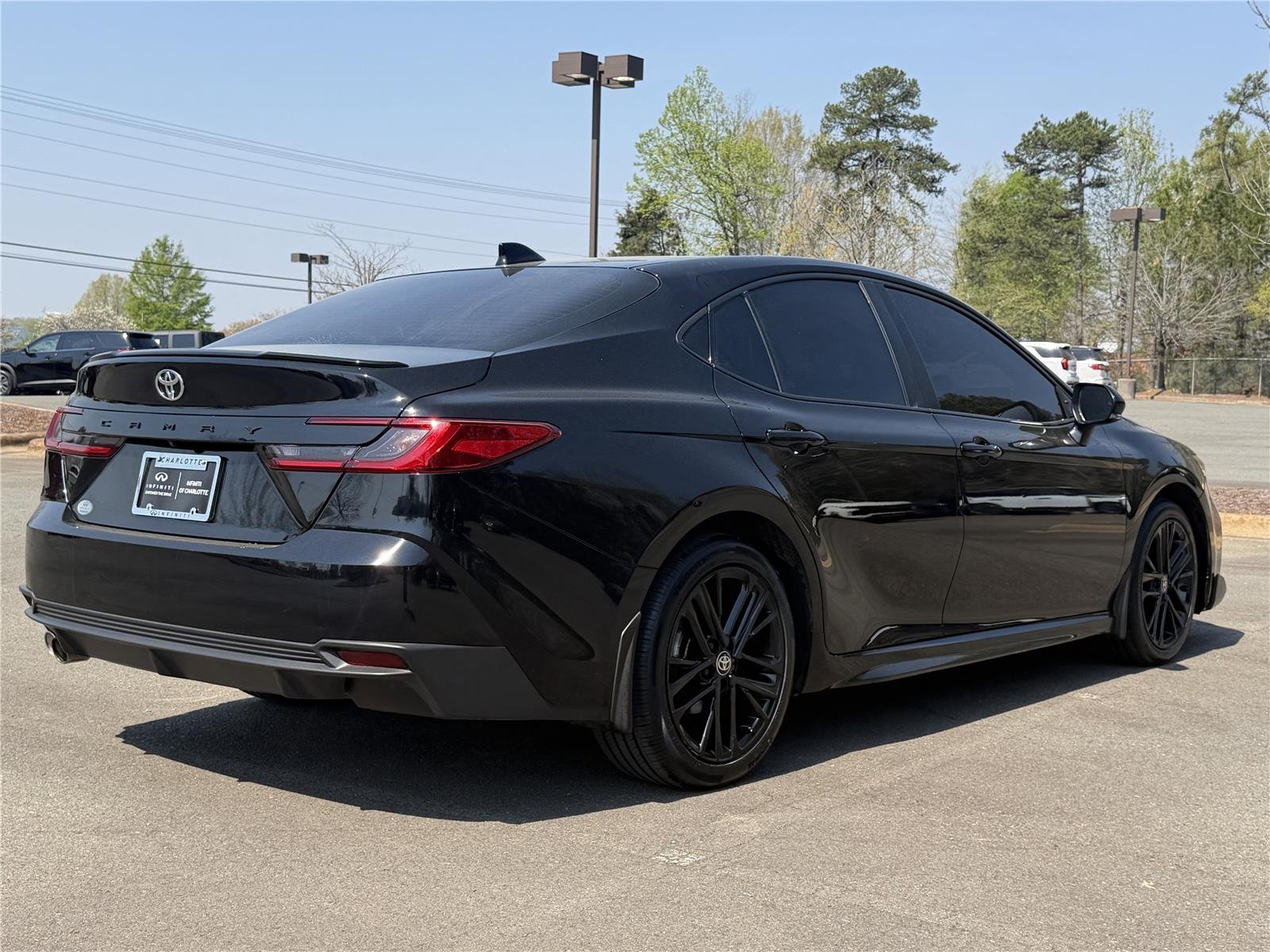 Used 2025 Midnight Black Metallic Toyota SE image 23