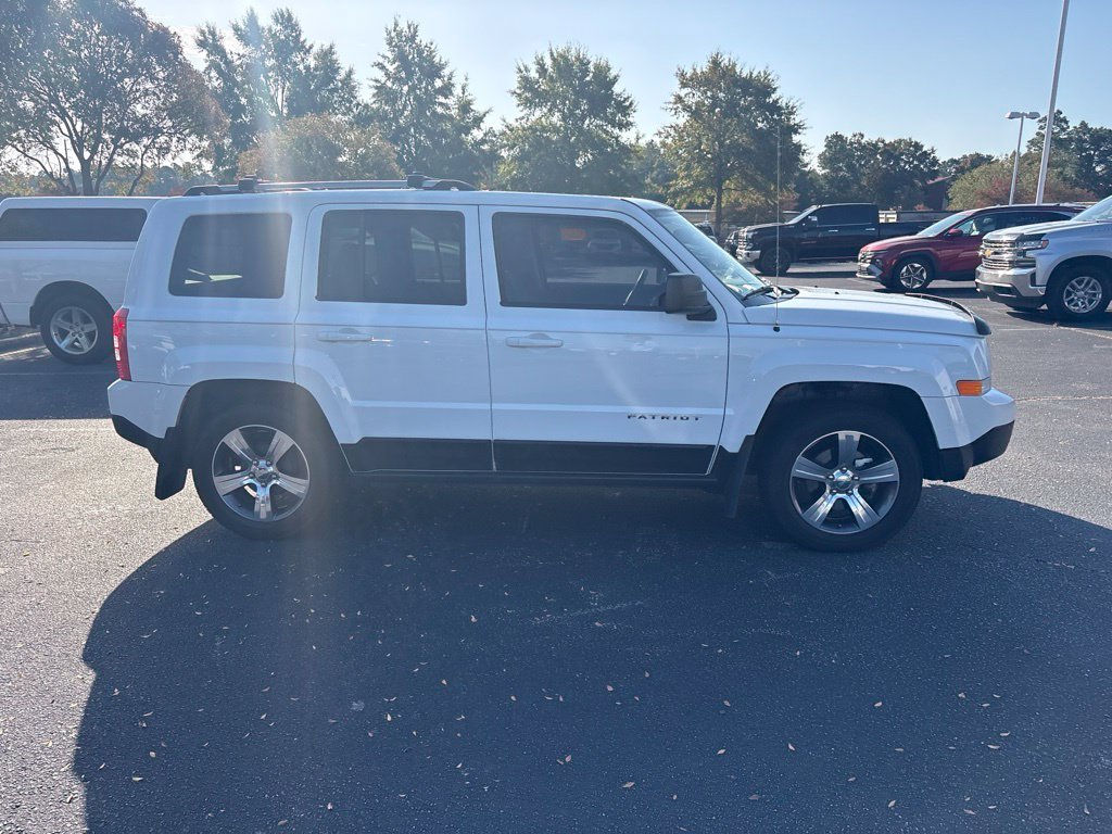 Used 2016 White Jeep High Altitude image 1