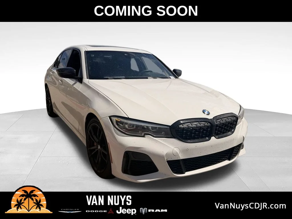 Used 2021 White BMW M340i xDrive image 1