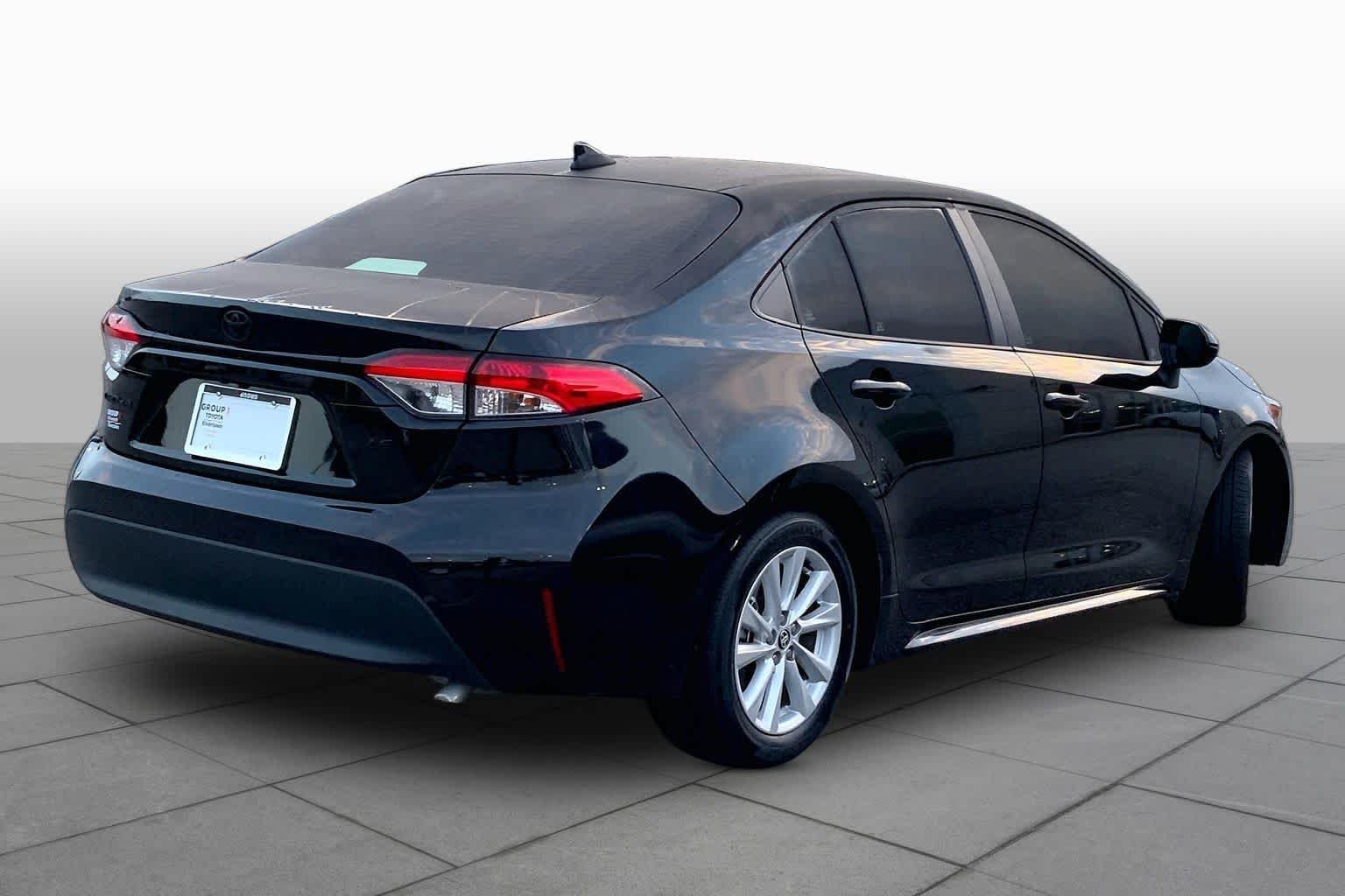 Used 2024 Midnight Black Metallic Toyota LE image 12