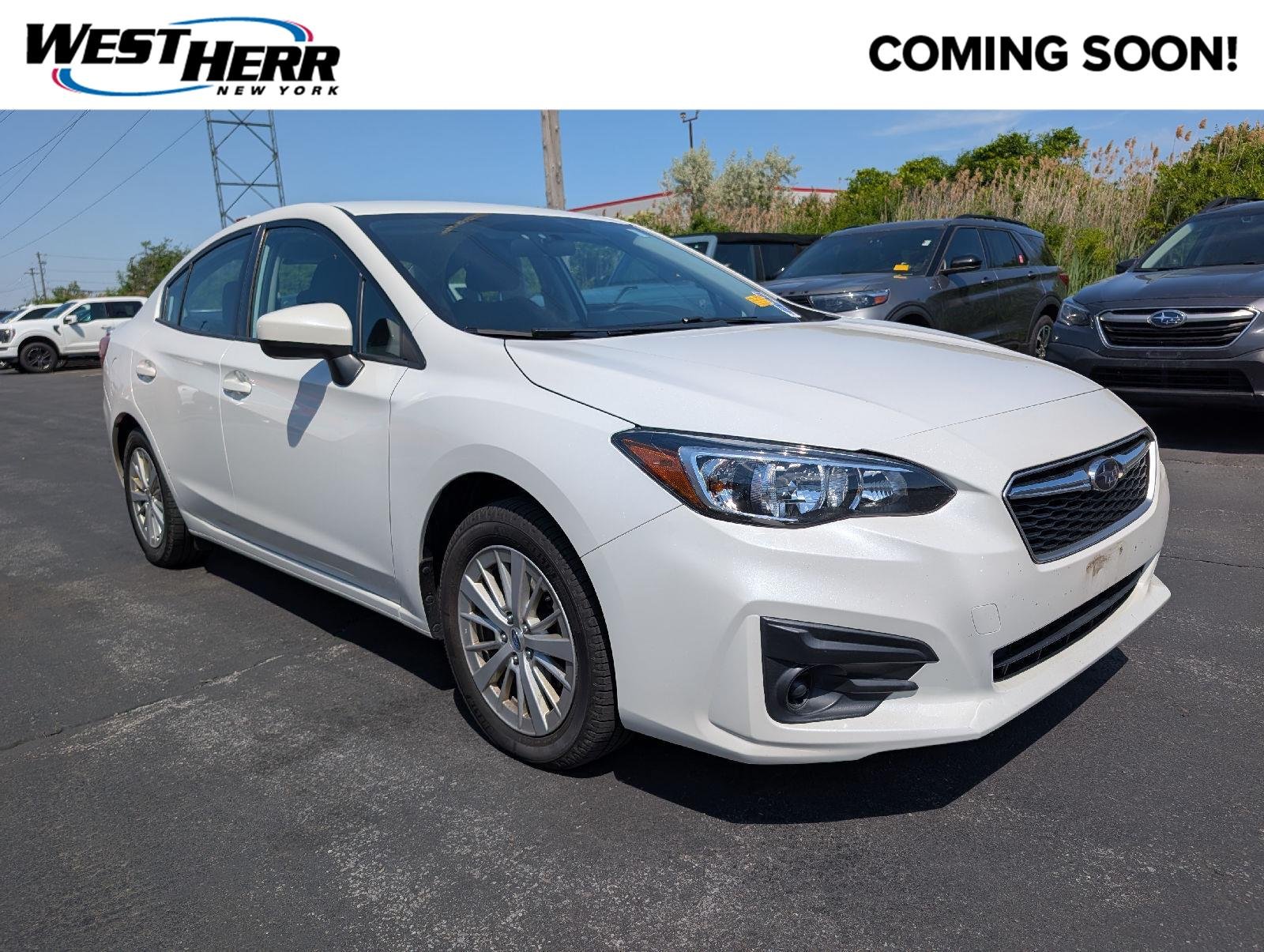 Used 2017 Crystal White Pearl Subaru Premium image 1