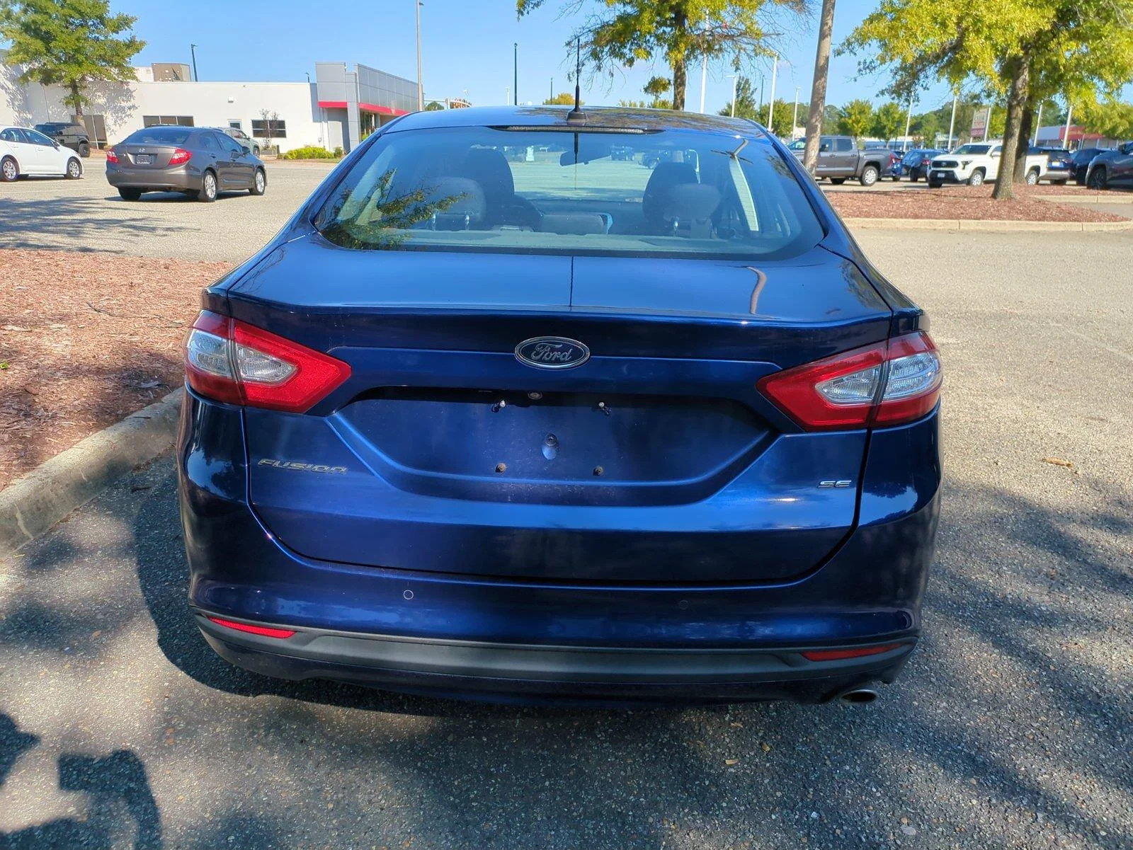 Used 2016 Deep Impact Blue Ford SE image 5