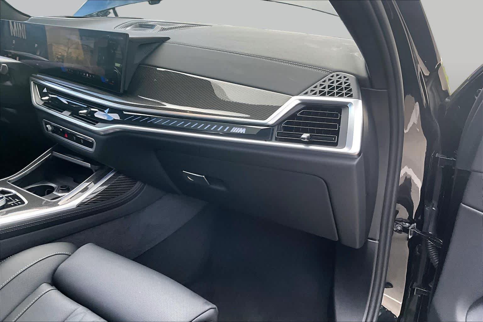 Used 2026 Black Sapphire Metallic BMW M60i image 17