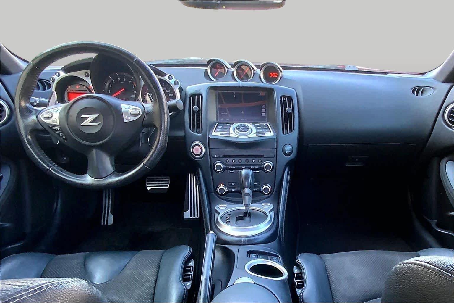 Used 2016 Solid Red Nissan Touring image 16